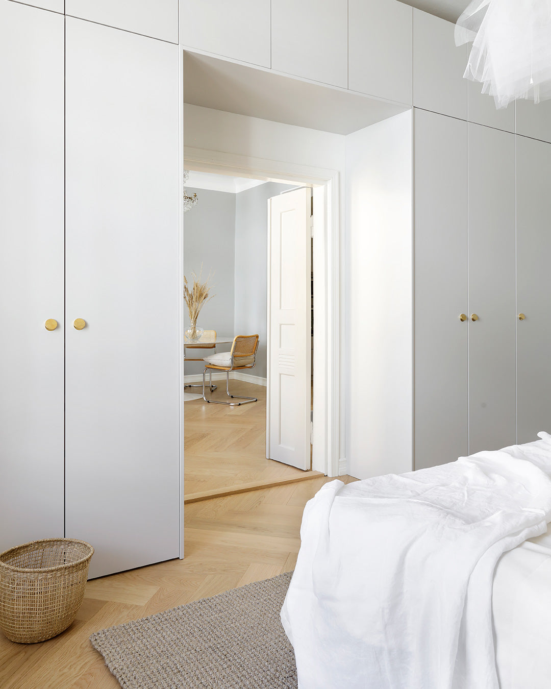 A.S.Helsingö Ingarö wardrobes in feather grey with brass BAGEL handles
